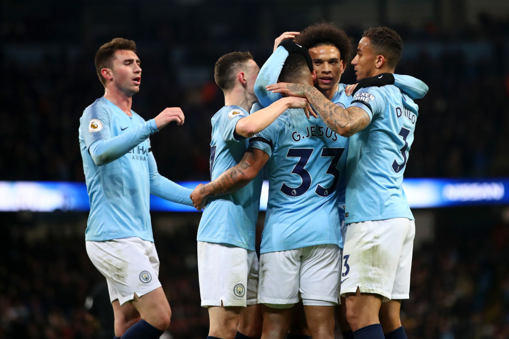 MANCHESTER, ENGLAND - APRIL 03: Leroy Sane of Manchester City celebrates with teammates after scoring his team's second goal during the Premier League match between Manchester City and Cardiff City at Etihad Stadium on April 03, 2019 in Manchester, United Kingdom. (Photo by Clive Brunskill/Getty Images)