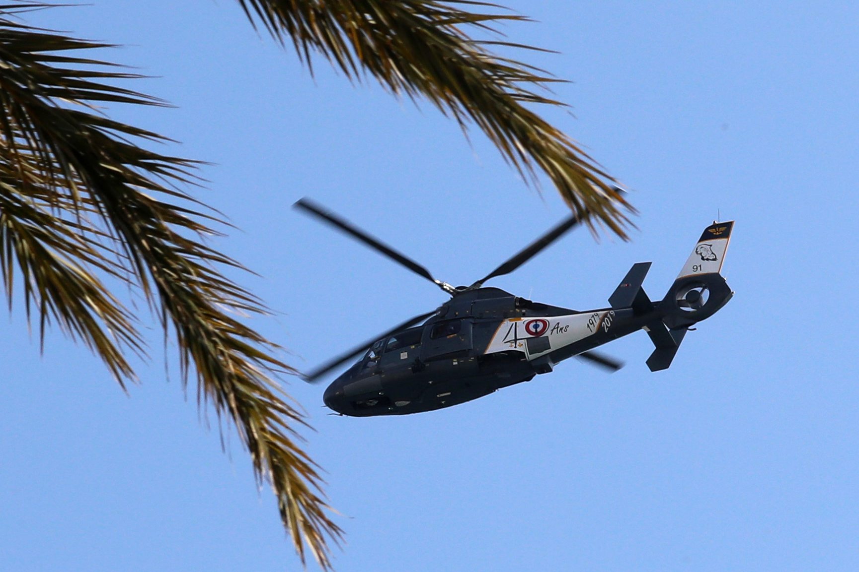 A French gendarmerie helicopter flies over the 