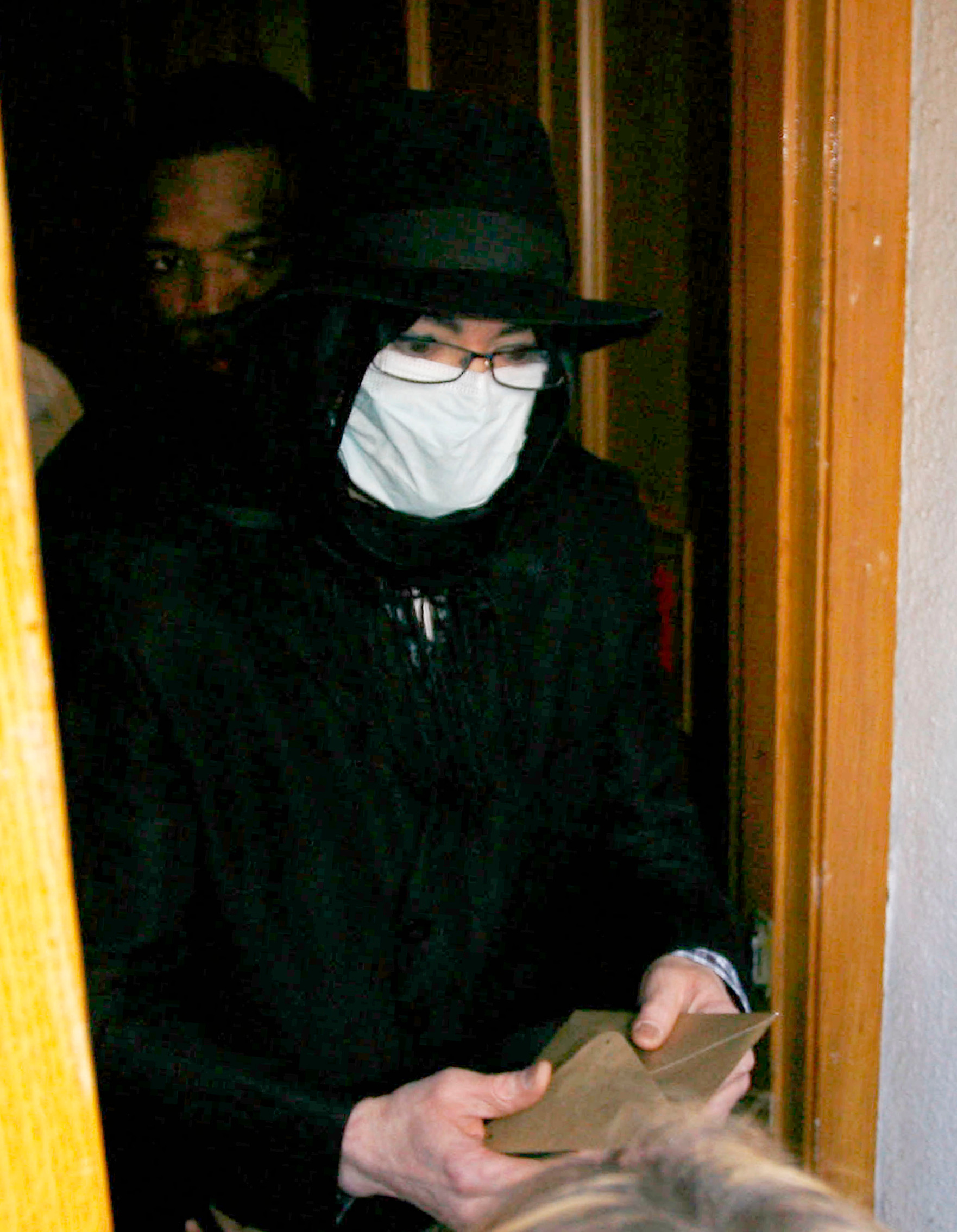 IMAGE ID # 1805916 Michael Jackson is mobbed by fans as he tries to sneak out the back door of a medical building in Beverly Hills, California this afternoon. The King of Pop kept as much as his face covered as possible as he made he way to his car, wearing a scarf over his head, a hat, and a surgical mask obscuring most of his face. Jackson did take a few moments to sign autographs for his adoring fans before hopping into his car with a packet of Kettle Chips to snack on while driving away. Despite rumors of serious financial troubles, Jackson is reportedly leasing a mansion in the ritzy Bel-Air section of Los Angeles for a whopping 0,000 a month.
 CR: Oâ€™Duran
  01/14/2009 --- Michael Jackson ---  - 310-395-0500 / Sales: 310-395-0500, Image: 29017463, License: Rights-managed, Restrictions: , Model Release: no, Credit line: FAME PICTURES / Backgrid USA / Profimedia