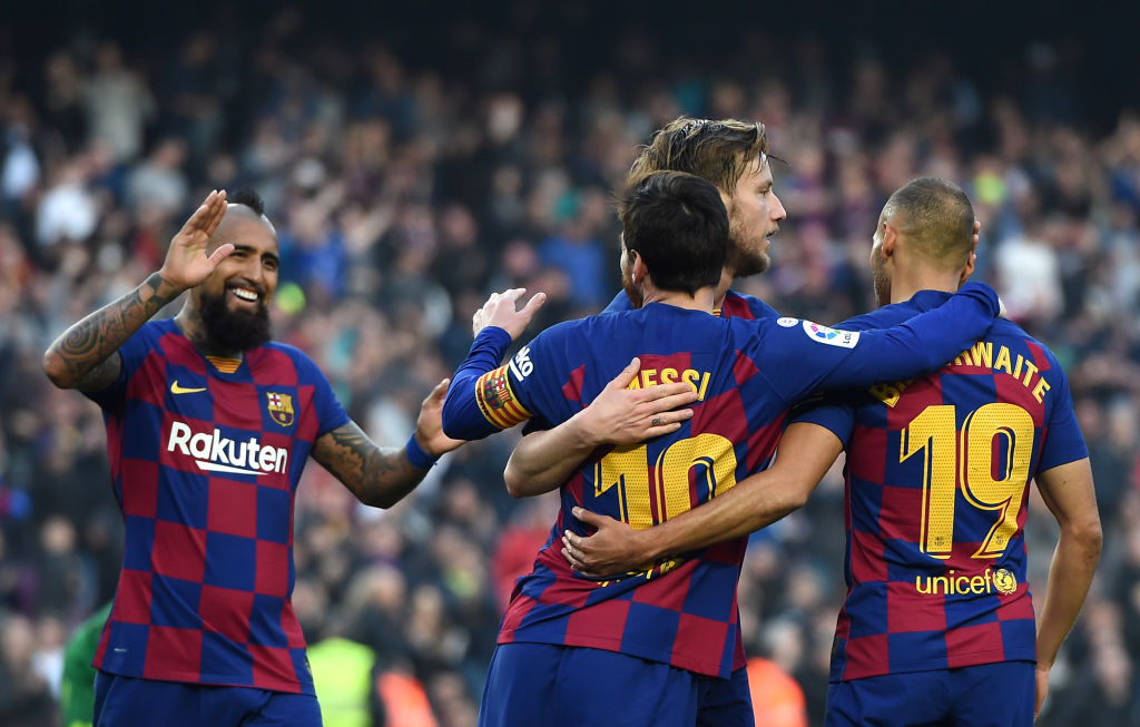 BARCELONA, SPAIN - FEBRUARY 22: Lionel Messi of FC Barcelona celebrates with teammates Martin Braithwaite, Arturo Vidal and Ivan Rakitic after scoring his team's fourth goal during the La Liga match between FC Barcelona and SD Eibar SAD at Camp Nou on February 22, 2020 in Barcelona, Spain. (Photo by Alex Caparros/Getty Images)