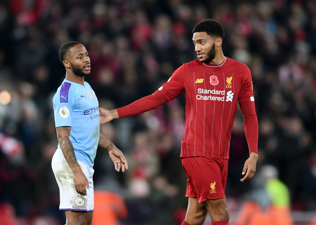 LIVERPOOL, ENGLAND - NOVEMBER 10: Raheem Sterling of Manchester City exchanges words with Joe Gomez of Liverpool following during the Premier League match between Liverpool FC and Manchester City at Anfield on November 10, 2019 in Liverpool, United Kingdom. (Photo by Laurence Griffiths/Getty Images)