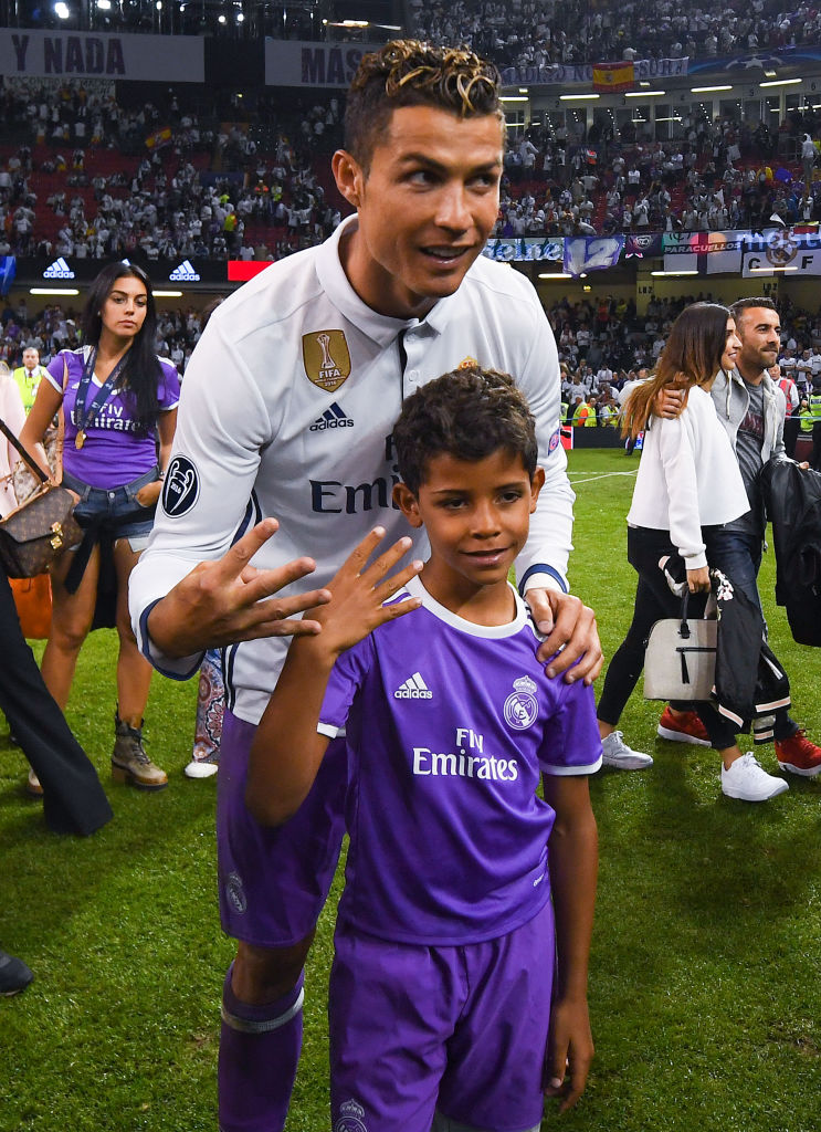 CARDIFF, WALES - JUNE 03:  Cristiano Ronaldo of Real Madrid CF celebrates with his son Cristiano Ronaldo  Jr. after the UEFA Champions League Final between Juventus and Real Madrid at National Stadium of Wales on June 3, 2017 in Cardiff, Wales.  (Photo by David Ramos/Getty Images)