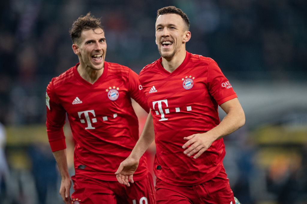 MOENCHENGLADBACH, GERMANY - DECEMBER 07: Ivan Perisic of FC Bayern Muenchen celebrates with teammate Leon Goretzka of FC Bayern Muenchen   after scoring his team's first goal  during the Bundesliga match between Borussia Moenchengladbach and FC Bayern Muenchen at Borussia-Park on December 07, 2019 in Moenchengladbach, Germany. (Photo by Frederic Scheidemann/Bongarts/Getty Images)