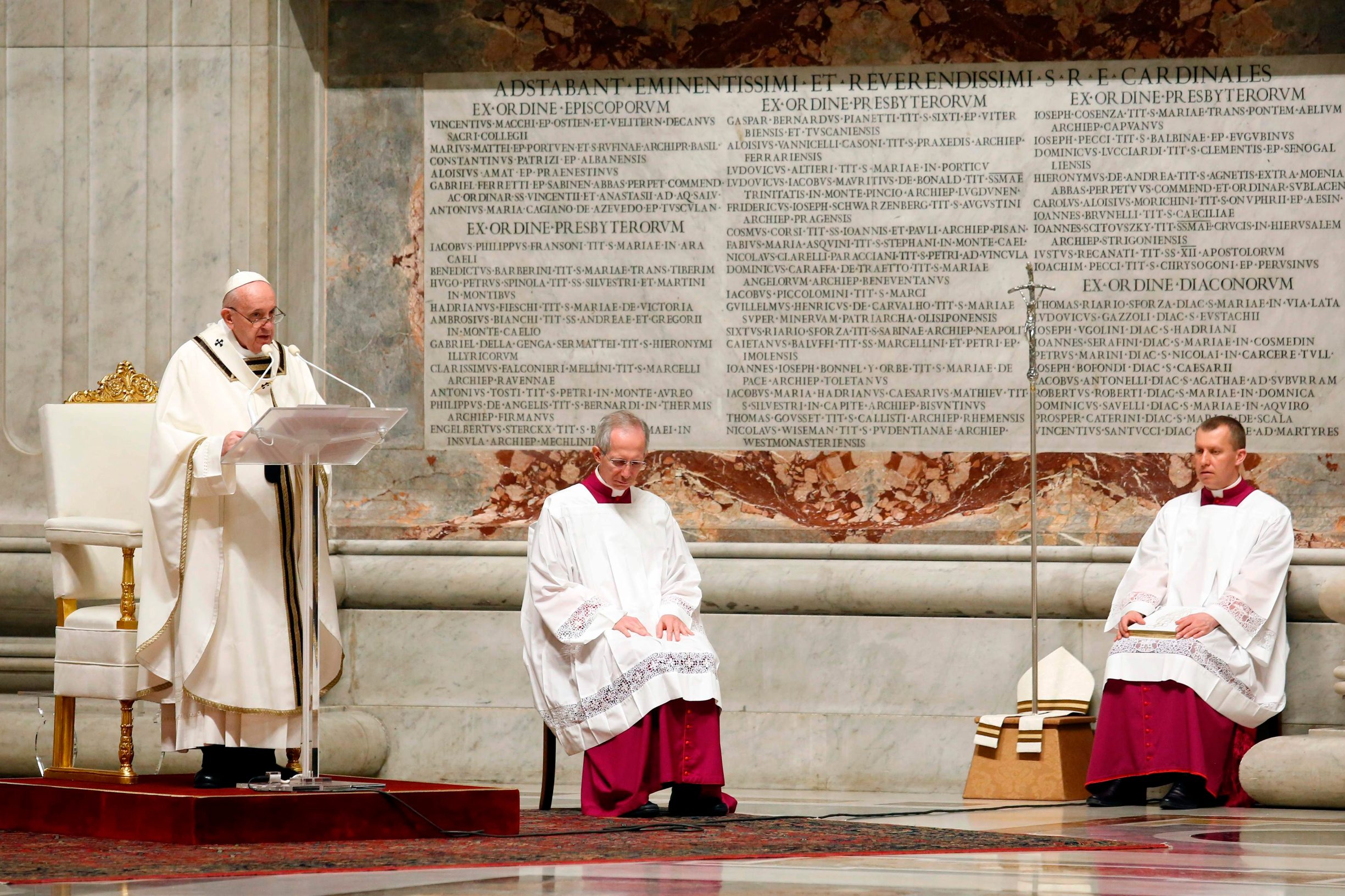 Pope Francis delivers a homily during Easter's Holy Saturday Vigil held behind closed doors at St. Peter's Basilica in the Vatican on April 11, 2020 during the lockdown aimed at curbing the spread of the COVID-19 infection, caused by the novel coronavirus. (Photo by REMO CASILLI / POOL / AFP)