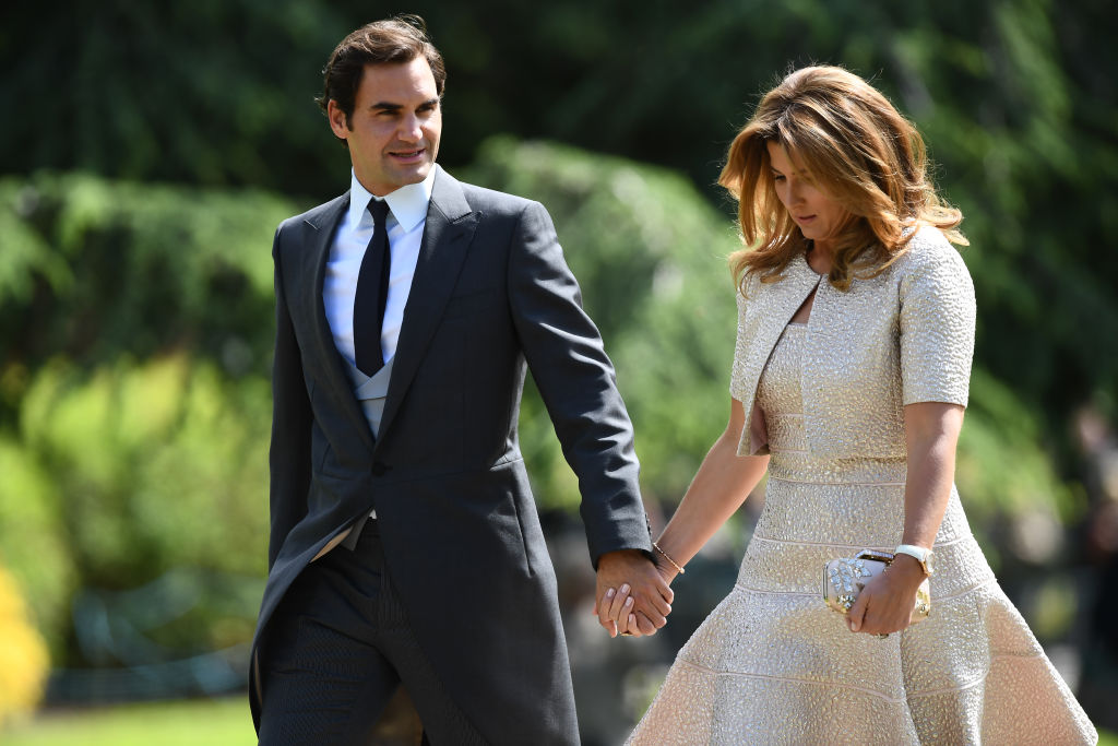 ENGLEFIELD GREEN, ENGLAND - MAY 20: Swiss tennis player Roger Federer (L) and his wife Mirka attend the wedding of Pippa Middleton and James Matthews at St Mark's Church on May 20, 2017 in Englefield Green, England. (Photo by Justin Tallis - WPA Pool/Getty Images)