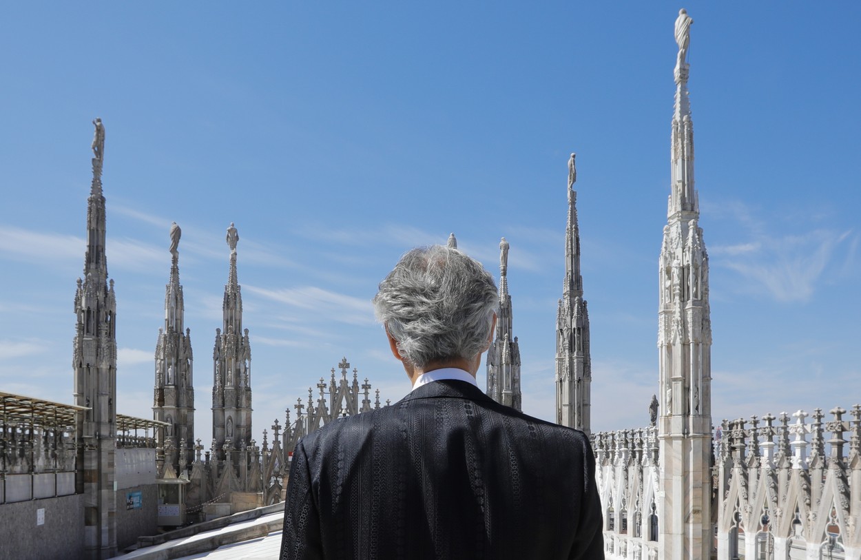 6219988 13.04.2021 In this handout photo released by Universal music press service, Italian tenor Andrea Bocelli stands on the roof of Duomo Cathedral before performing a solo 