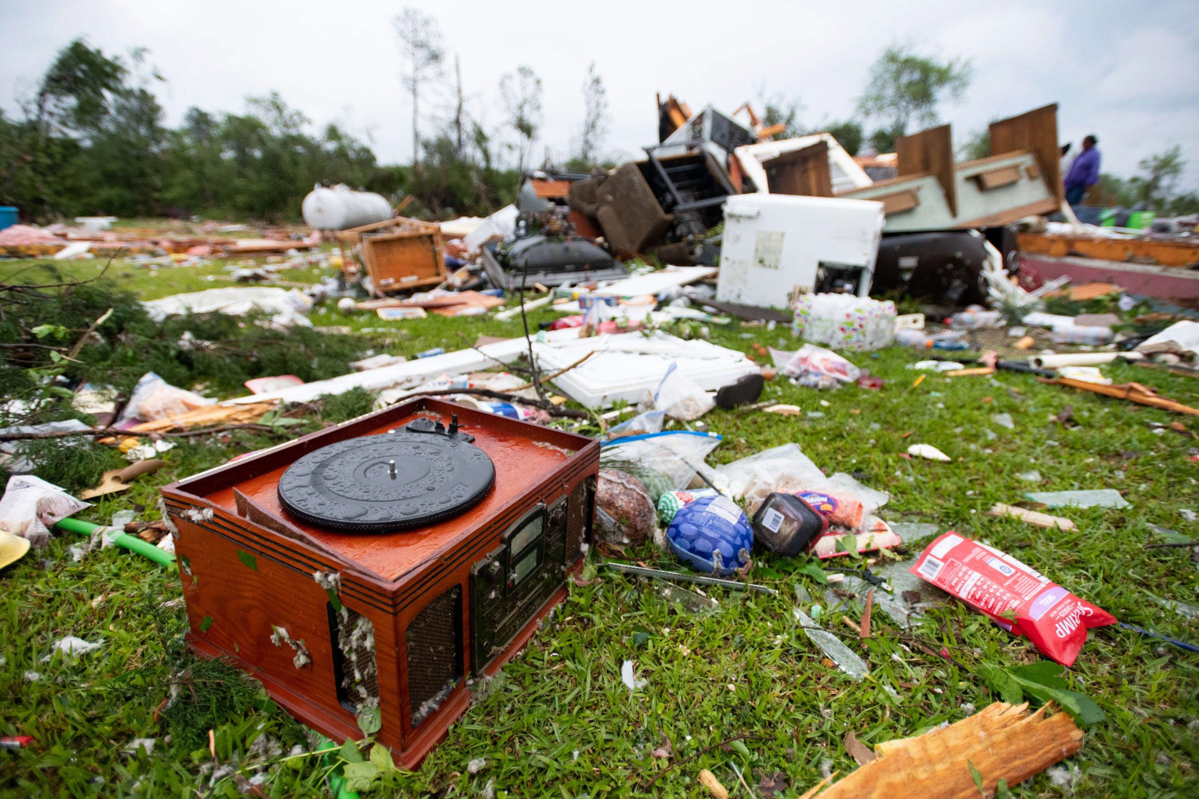 LIVINGSTON, SC - APRIL 13: A record player sits in the yard of storm damaged home April 13, 2020 in Livingston, South Carolina. A string of storms caused more than a dozen deaths across the southern United States.   Sean Rayford/Getty Images/AFP
== FOR NEWSPAPERS, INTERNET, TELCOS & TELEVISION USE ONLY ==
