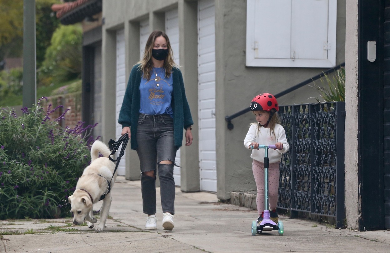 Los Angeles, CA  - *EXCLUSIVE* Actress, Olivia Wilde and her daughter enjoy a nice stroll while walking their dog in their Los Angeles neighborhood. While Olivia donned a mask for protection her daughter opted for no mask but helmet protection while riding her scooter.

*UK Clients - Pictures Containing Children
Please Pixelate Face Prior To Publication*, Image: 513721498, License: Rights-managed, Restrictions: , Model Release: no, Credit line: Javiles/Bruce / BACKGRID / Backgrid USA / Profimedia