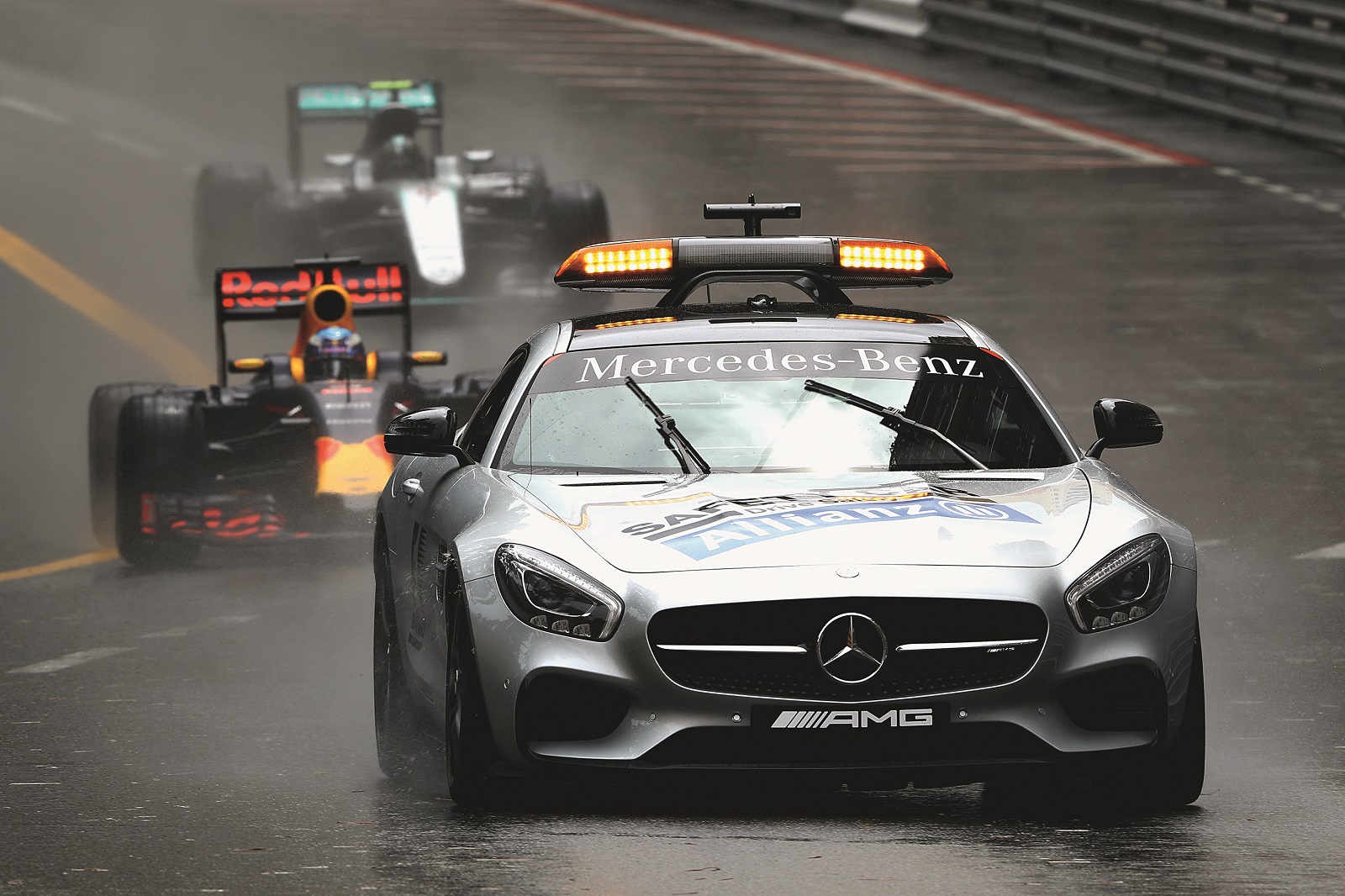 MONTE-CARLO, MONACO - MAY 29: The safety car leads Daniel Ricciardo of Australia driving the (3) Red Bull Racing Red Bull-TAG Heuer RB12 TAG Heuer and Nico Rosberg of Germany driving the (6) Mercedes AMG Petronas F1 Team Mercedes F1 WO7 Mercedes PU106C Hybrid turbo at the start during the Monaco Formula One Grand Prix at Circuit de Monaco on May 29, 2016 in Monte-Carlo, Monaco.  (Photo by Mark Thompson/Getty Images)