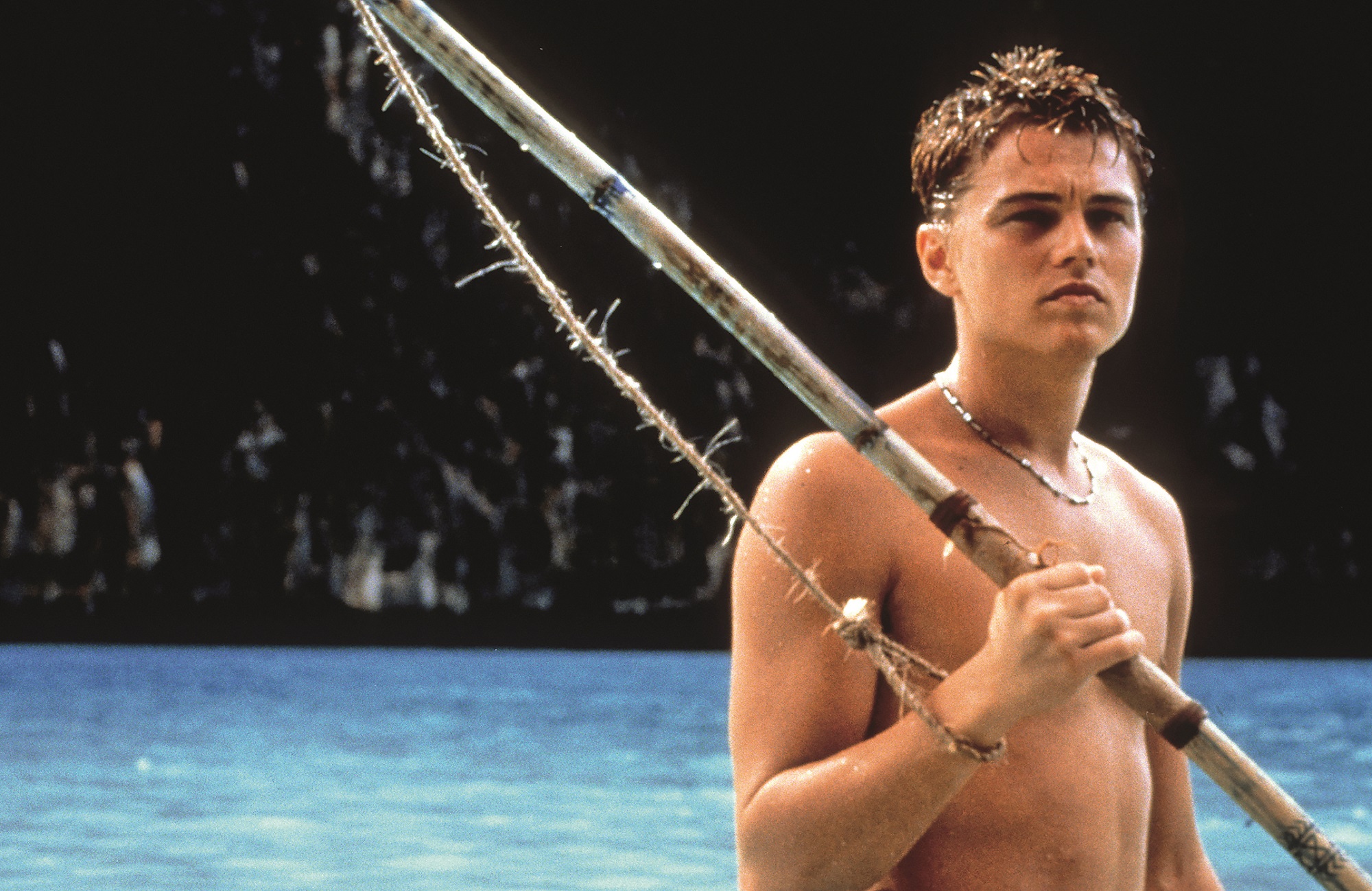 Leonardo DiCaprio by the clear water in scene from the film 'The Beach', 2000. (Photo by 20th Century-Fox/Getty Images)