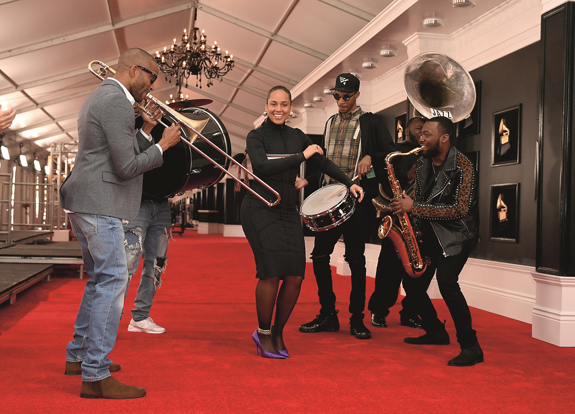 LOS ANGELES, CALIFORNIA - FEBRUARY 07: Alicia Keys, (L) Trombone Shorty and his band attend the 61st Annual GRAMMY Awards Red Carpet Roll Out and Preview Day during the 61st Annual GRAMMY Awards at Staples Center on February 07, 2019 in Los Angeles, California. (Photo by Kevin Winter/Getty Images for The Recording Academy)