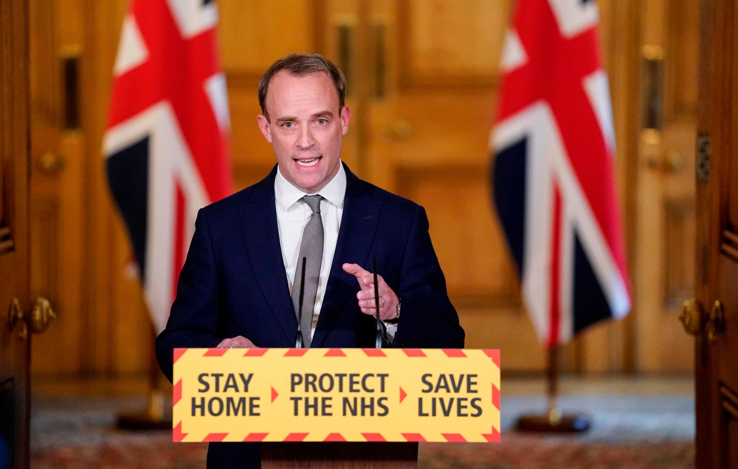 A handout image released by 10 Downing Street, shows Britain's Foreign Secretary Dominic Raab speaking during a remote press conference to update the nation on the Covid-19 pandemic, inside 10 Downing Street in central London on April 16, 2020. - Britain will extend its coronavirus lockdown for 