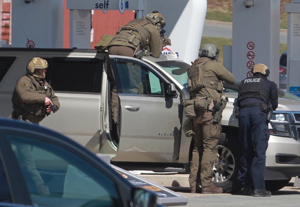 April 19, 2020, Enfield, NS, Canada: RCMP officers prepare to take a person into custody at a gas station in Enfield, N.S. on Sunday April 19, 2020. A suspect in an active shooter investigation is in custody in Nova Scotia, with police saying several people were harmed before a man wearing police clothing was arrested. Gabriel Wortman was arrested by the RCMP at the Irving Big Stop in Enfield, N.S., about 35 km from downtown Halifax., Image: 514293813, License: Rights-managed, Restrictions: * Canada and U.S. RIGHTS OUT *, Model Release: no, Credit line: Tim Krochak / Zuma Press / Profimedia