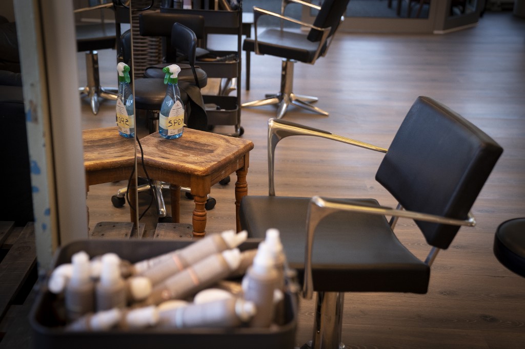 Chairs are seen at Hairdresser Hot N Tot during its reopeningn in Bagsvaerd near Copenhagen, April 20, 2020, amid the new coronavirus COVID-19 pandemic. - There is a pause before and after each customer and the hairdressers have permanent workstations. Customers wait for a good distance and every plastic shackle for customers' outerwear is thrown in the trash after use. Parts of Europe hit hard by the deadly coronavirus pandemic took tentative steps towards resuming normal lives on April 20, 2020. (Photo by Liselotte Sabroe / Ritzau Scanpix / AFP) / Denmark OUT