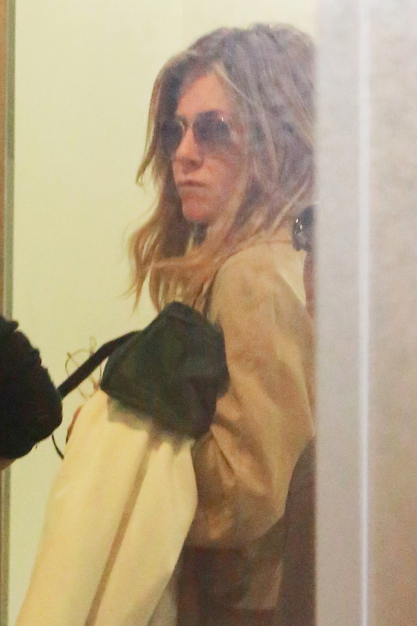 *EXCLUSIVE* Beverly Hills, CA - Jennifer Aniston is seen out since attending the funeral of mother, Nancy Dow. The actress tries to keep a low profile as she darts to and from rooms during a check up at a medical clinic. Reports say that the actress attended the funeral of her late mother in Dow's apartment with husband Justin Theroux and father John Aniston by her side. She stated that her and her mother had reconciled and were on good terms before her passing after a battle of many illnesses. Sources online claim that the funeral itself was different than the norm, as it took place inside the apartment which she lived in and was casual and informal.        June 5, 2016, Image: 289099767, License: Rights-managed, Restrictions: NO Brazil, Model Release: no, Credit line: W Blanco / Backgrid USA / Profimedia