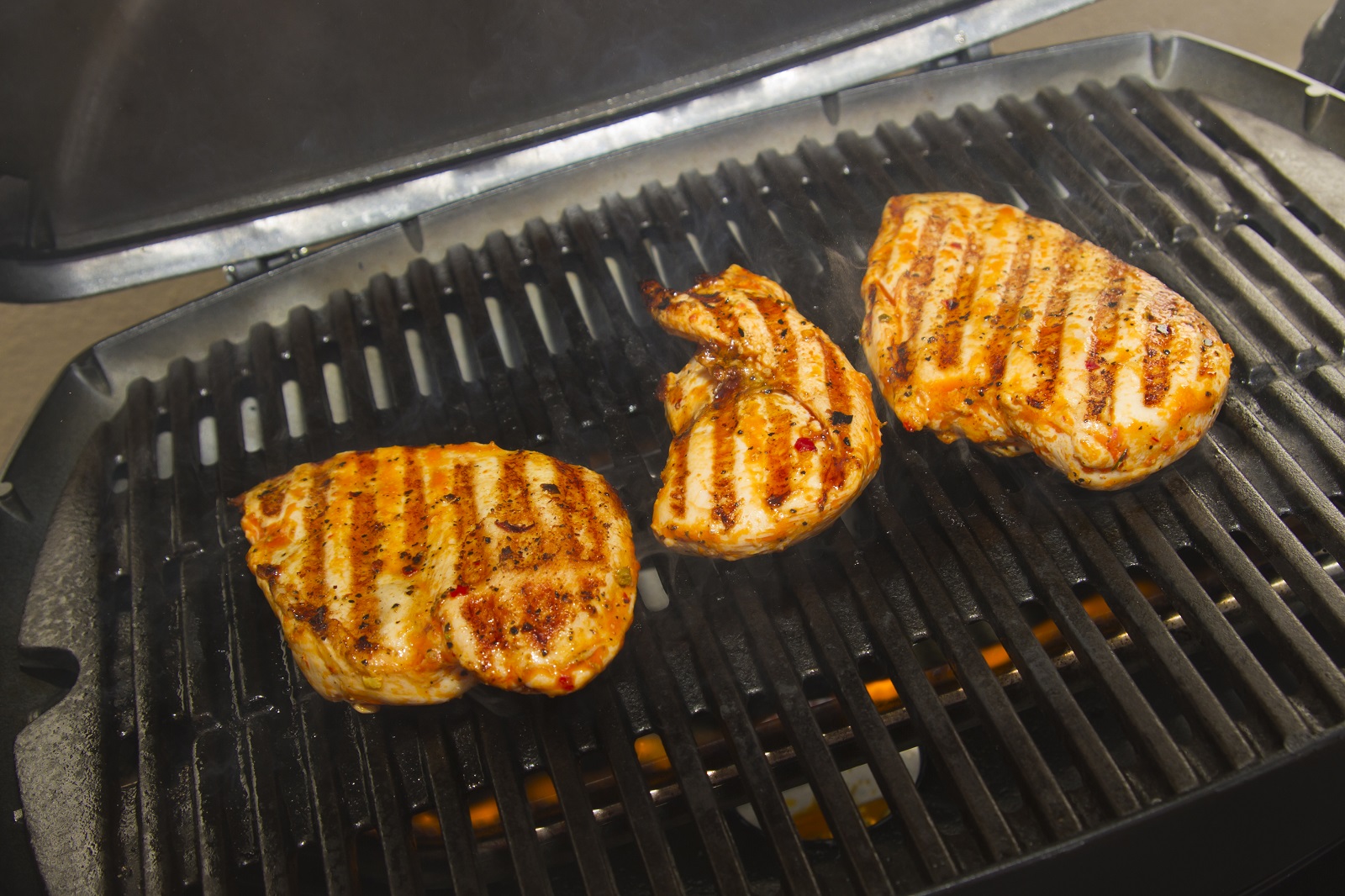 Chicken meat on a grill