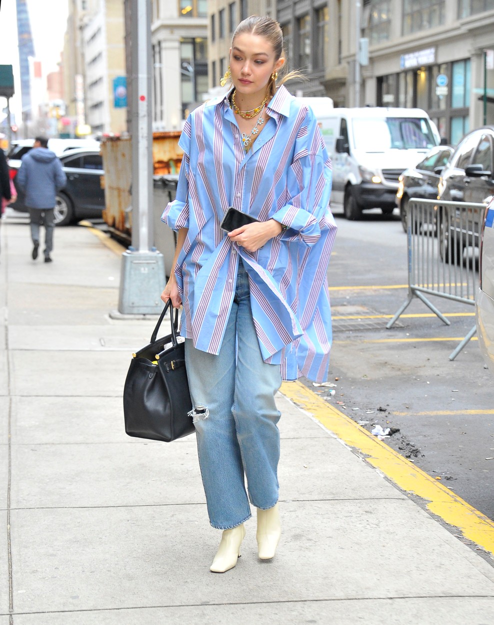 02/05/2020 EXCLUSIVE: Gigi Hadid is pictured stepping out in New York City. The 24 year old supermodel wore an oversized striped dress shirt, light blue jeans, and white heels., Image: 496629905, License: Rights-managed, Restrictions: Exclusive NO usage without agreed price and terms. Please contact sales@theimagedirect.com, Model Release: no, Credit line: TheImageDirect.com / The Image Direct / Profimedia