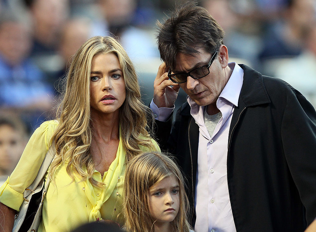 NEW YORK, NY - JUNE 23:  Denise Richards and Charlie Sheen look for their seats as the New York Yankees take on the New York Mets on June 23, 2012 during interleague play at Citi Field in the Flushing neighborhood of the Queens borough of New York City.  (Photo by Elsa/Getty Images)