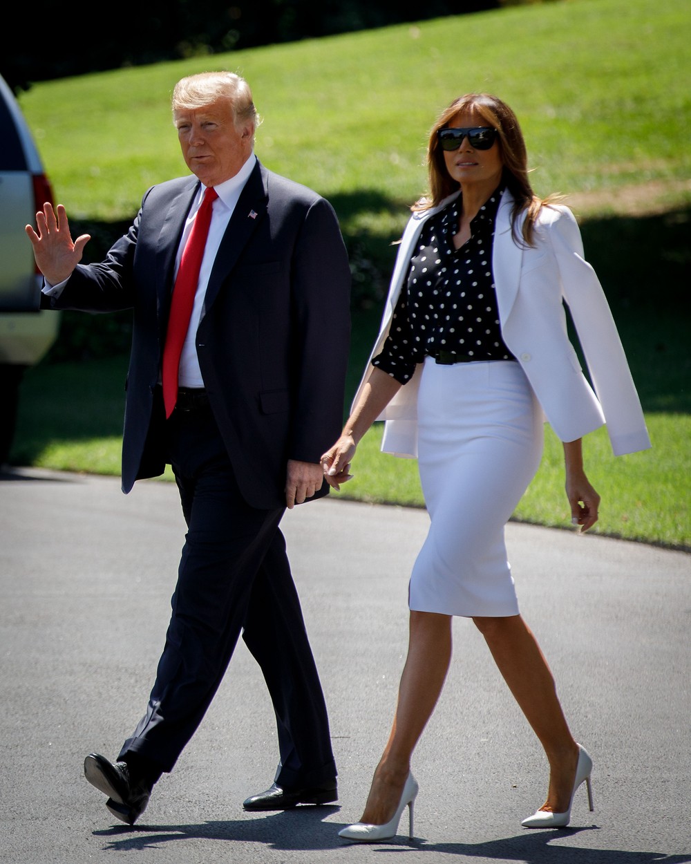 (180824) -- WASHINGTON, Aug. 24, 2018 () -- U.S. President Donald Trump and First Lady Melania Trump depart from the White House in Washington D.C., the United States, on Aug. 24, 2018. U.S. President Donald Trump on Friday tweeted that he has asked Secretary of State Mike Pompeo to cancel his upcoming trip to the Democratic People's Republic of Korea (DPRK), citing the lacking of progress on the Peninsula denuclearization., Image: 383933220, License: Rights-managed, Restrictions: WORLD RIGHTS excluding China - Fee Payable Upon Reproduction - For queries contact Avalon.red - sales@avalon.red London: +44 (0) 20 7421 6000 Los Angeles: +1 (310) 822 0419 Berlin: +49 (0) 30 76 212 251 Madrid: +34 91 533 4289, Model Release: no, Credit line: Ting Shen / Avalon Editorial / Profimedia