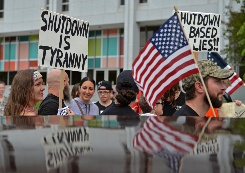 RALEIGH, USA - APRIL 21: Protesters from a grassroots organization called REOPEN NC gather to pressure North Carolina Governor Roy Cooper to reopen the State in Raleigh, NC, United States on April 21, 2020. Peter Zay / Anadolu Agency