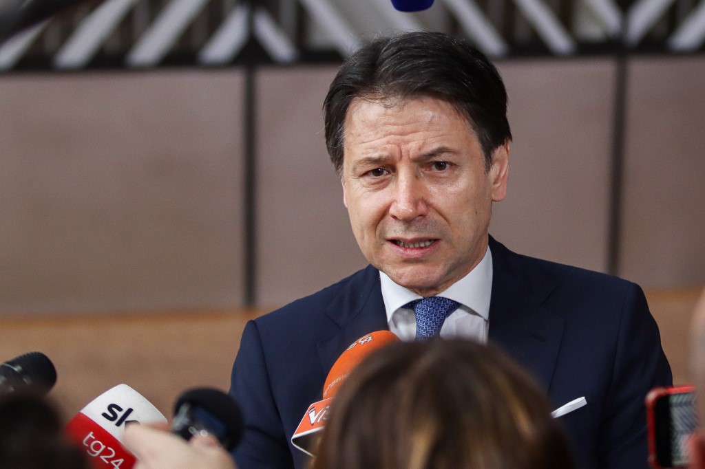 Prime Minister of Italy Giuseppe Conte as seen arriving on the red carpet with EU flags at forum Europa building. The Italian PM is having a doorstep press and media briefing during the second day of the special European Council, EURO leaders summit - meeting about for the negotiations of the future planning of the next long term budget, financial framework of the European Union for 2021-2027. Brussels, Belgium, February 21, 2020 (Photo by Nicolas Economou/NurPhoto)