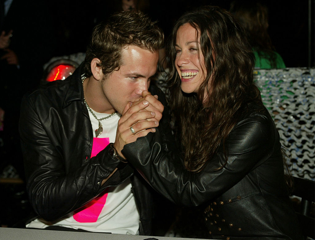 (U.S. TABS OUT)  Ryan Reynolds and Alanis Morissette backstage at The 2003 MTV Movie Awards held at the Shrine Auditorium on May 31, 2003 in Los Angeles, California. (Photo by Kevin Winter/Getty Images)