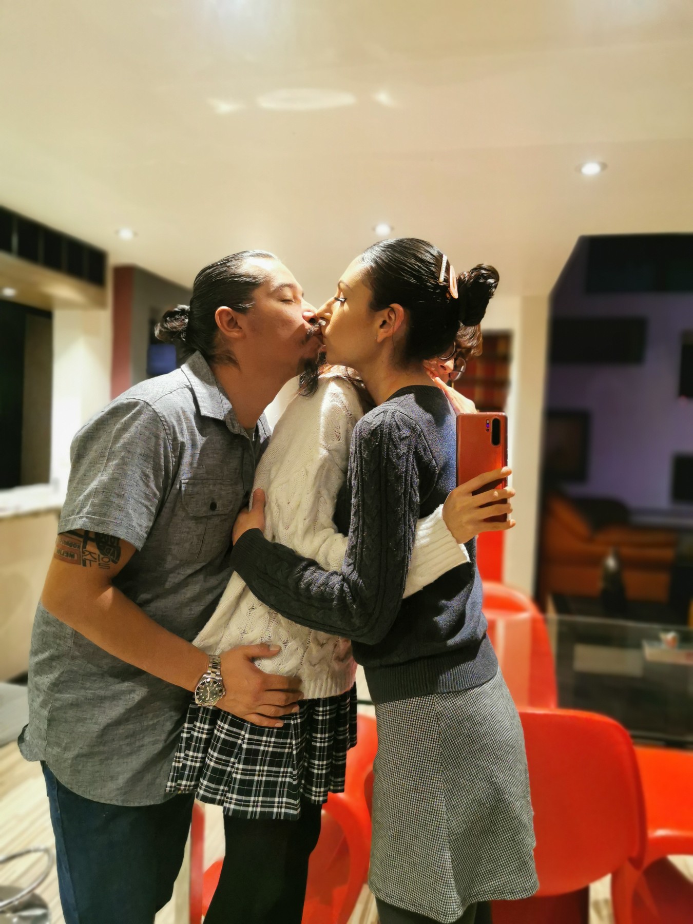 Melin hugging Lucy whilst kissing Rodrigo. MONTERREY CITY, MEXICO: THIS COUPLE married ONE WEEK AFTER THEY FIRST MET and have since invited a woman TWENTY-THREE YEARS his junior to join their relationship. On May 14, 2012, marketing entrepreneur, Rodrigo Contreras Diaz (41) from Monterrey City, Mexico, met his now wife, nutritionist, Melin Velasco Reyes (31) from Guadalajara City, through a mutual friend. Sparks flew instantly and Rodrigo ended up proposing to Melin that same day, to which she agreed. After just a week of preparations, they got married on May 21, 2012. Despite only having eyes for her, he explained to her early on in their relationship that he didn?t want a traditional monogamous relationship as he lived an alternative lifestyle and was open to a polyamorous relationship, which she accepted. For four years they focussed on their relationship then re-visited their exploration of other forms of partnerships and searched for another woman to join them in their union. On April 27, 2016, whilst they were both at a bar, they met one of the waitresses, Lucy (18), who was in high school at the time. Initially Lucy was shocked when Rodrigo began flirting with her in front of Melin, but after a few hours of chatting, they became closer and formed a polyamorous relationship. Since then, he admits that the addition of Lucy has positively improved his marriage with Melin and they now all plan to get married as a throuple, although Melin and Lucy, who are both straight, do not have a sexual relationship. mediadrumworld.com / @trikytriad, Image: 510886266, License: Rights-managed, Restrictions: , Model Release: no, Credit line: mediadrumworld.com / @trikytriad / Media Drum World / Profimedia