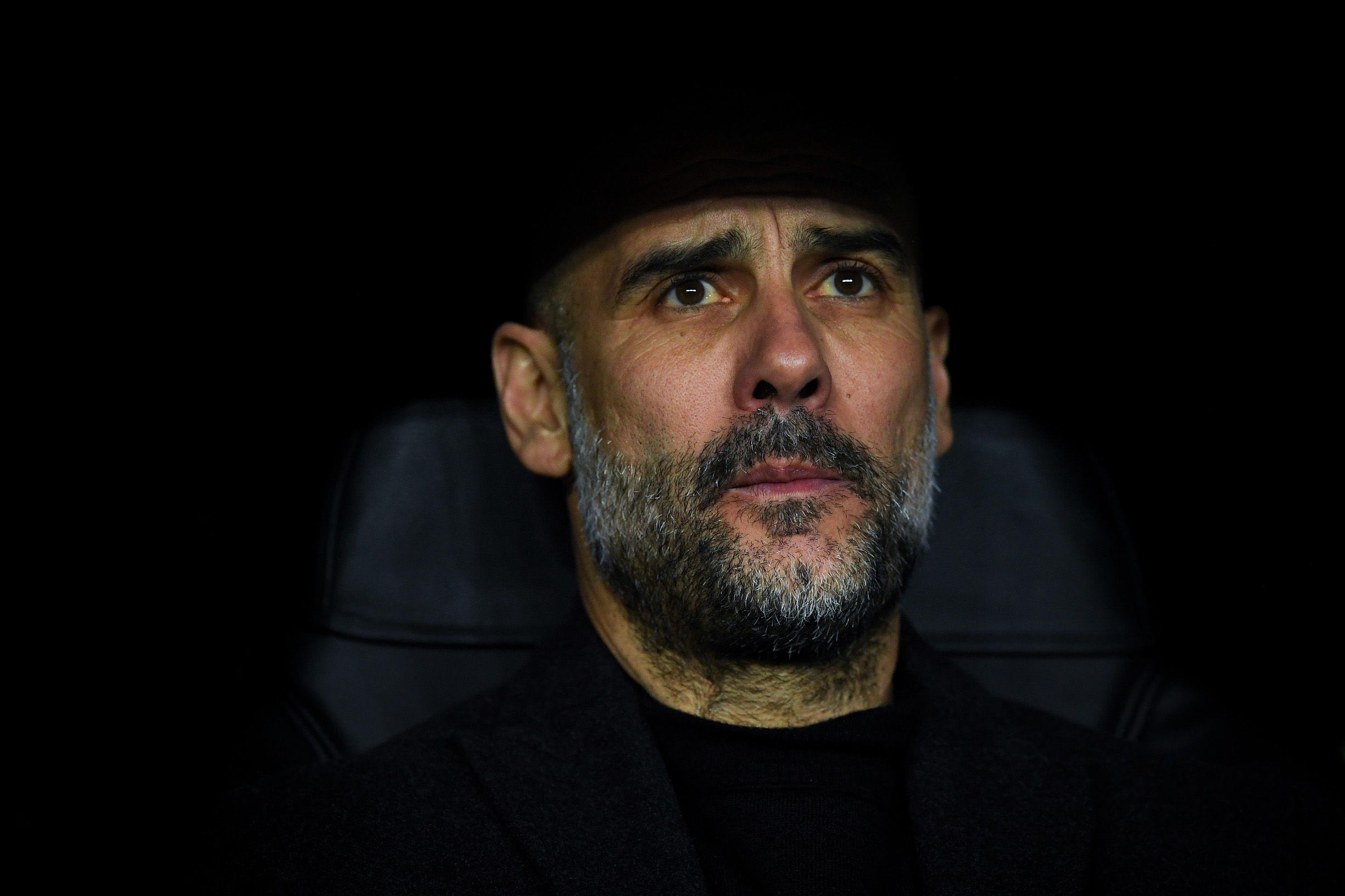 MADRID, SPAIN - FEBRUARY 26: Josep Guardiola, manager of Manchester City FC looks on during the UEFA Champions League round of 16 first leg match between Real Madrid and Manchester City at Bernabeu on February 26, 2020 in Madrid, Spain. (Photo by David Ramos/Getty Images)