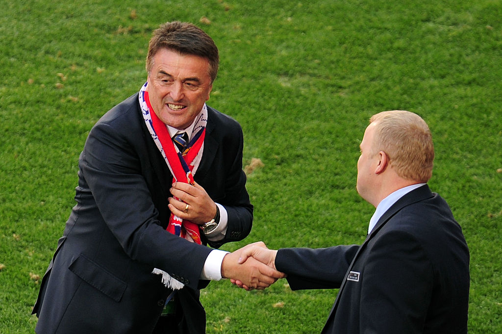 PORT ELIZABETH, SOUTH AFRICA - JUNE 18:  Radomir Antic head coach of Serbia celebrates victory after the 2010 FIFA World Cup South Africa Group D match between Germany and Serbia at Nelson Mandela Bay Stadium on June 18, 2010 in Port Elizabeth, South Africa.  (Photo by Clive Mason/Getty Images)