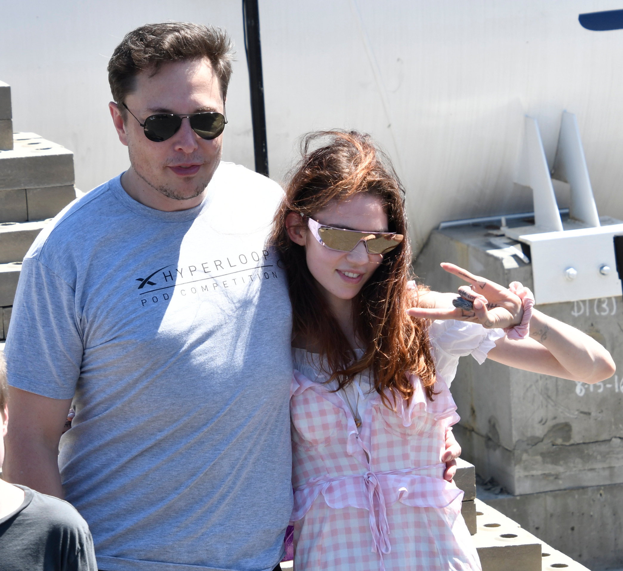 July 22, 2018 - Hawthorne, California, U.S. - SpaceX CEO ELON MUSK with his new girlfriend, UK singer singer GRIMES, as the last of 4 teams of students comprised of over 600 competitors from more than 40 countries around the world compete to showcase their pods at SpaceX's third Hyperloop Pod Competition Sunday. The winning team was WARR Hyperloop, as they hit speeds of 284 mph today., Image: 378968586, License: Rights-managed, Restrictions: , Model Release: no, Credit line: Gene Blevins / Zuma Press / Profimedia