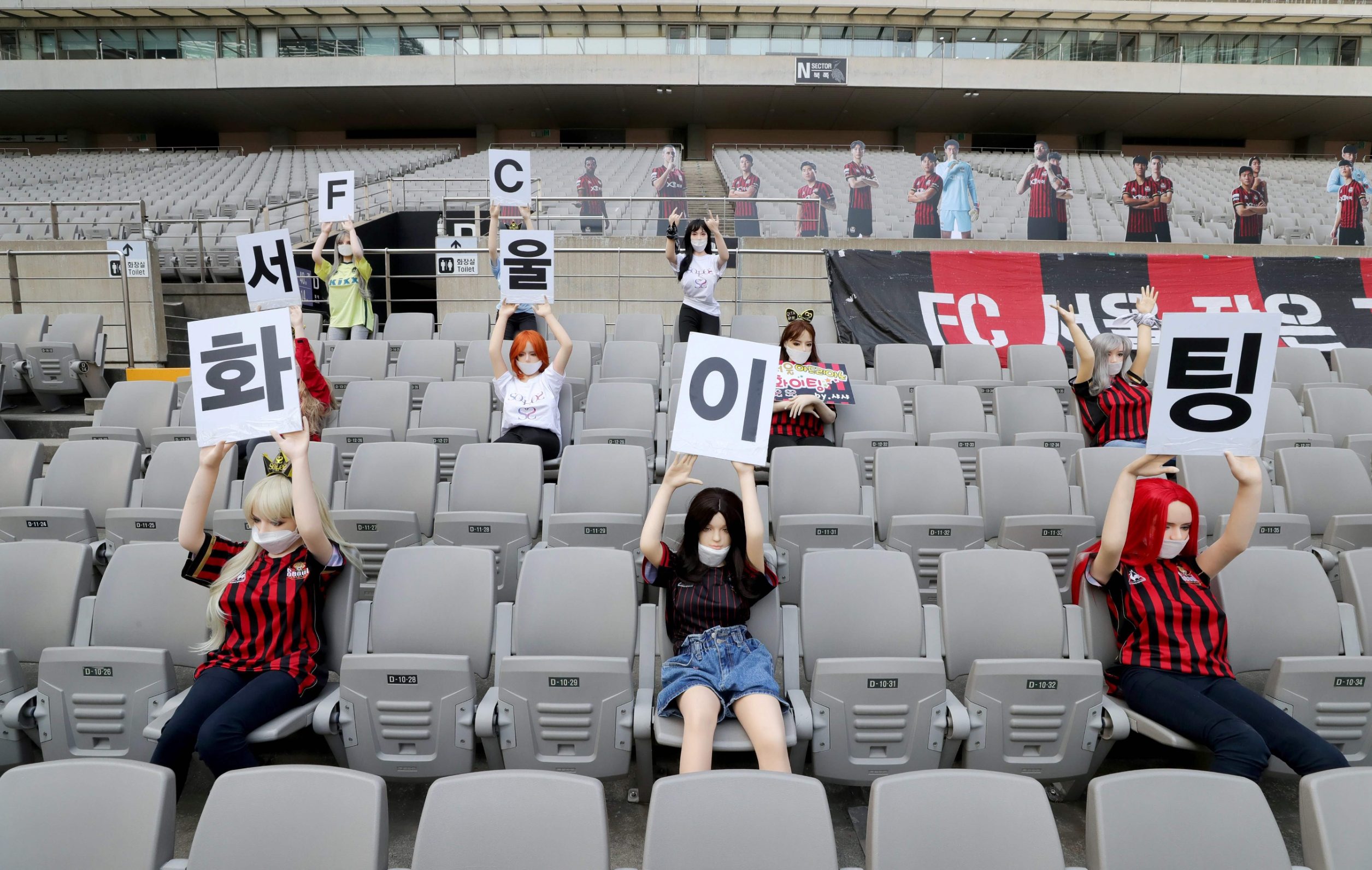 In a photo taken on May 17, 2020 mannequins are displayed at a FC Seoul football match in Seoul. - South Korean football club FC Seoul apologised May 18, 2020 after reports that it had used sex dolls to fill up its empty stands during a game at the weekend. (Photo by - / YONHAP / AFP) / - South Korea OUT / REPUBLIC OF KOREA OUT  NO ARCHIVES  RESTRICTED TO SUBSCRIPTION USE