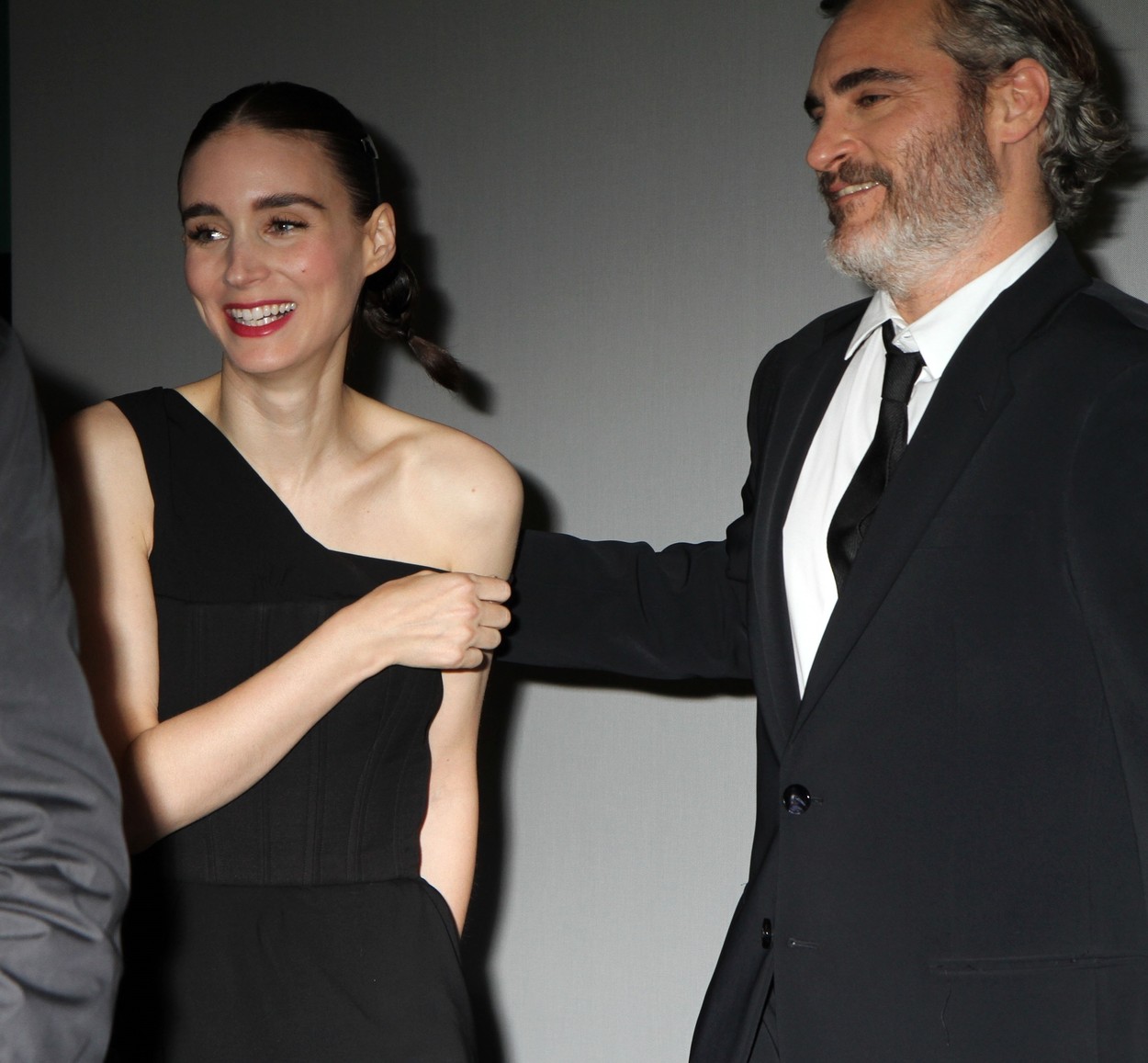 New York, NY  - A rare moment captures lovers Joaquin Phoenix and Rooney Mara together. Both very private, they refused to walk a carpet together at the 'Joker' premiere in NYC. Also NOT allowed were any TV press.

BACKGRID USA 2 OCTOBER 2019, Image: 474924988, License: Rights-managed, Restrictions: I have NOT marked this as exclusive....but I got these shots OFF the carpet. I want them to go out but others on the carpet did not get these, Model Release: no, Credit line: Diane Cohen / BACKGRID / Backgrid USA / Profimedia