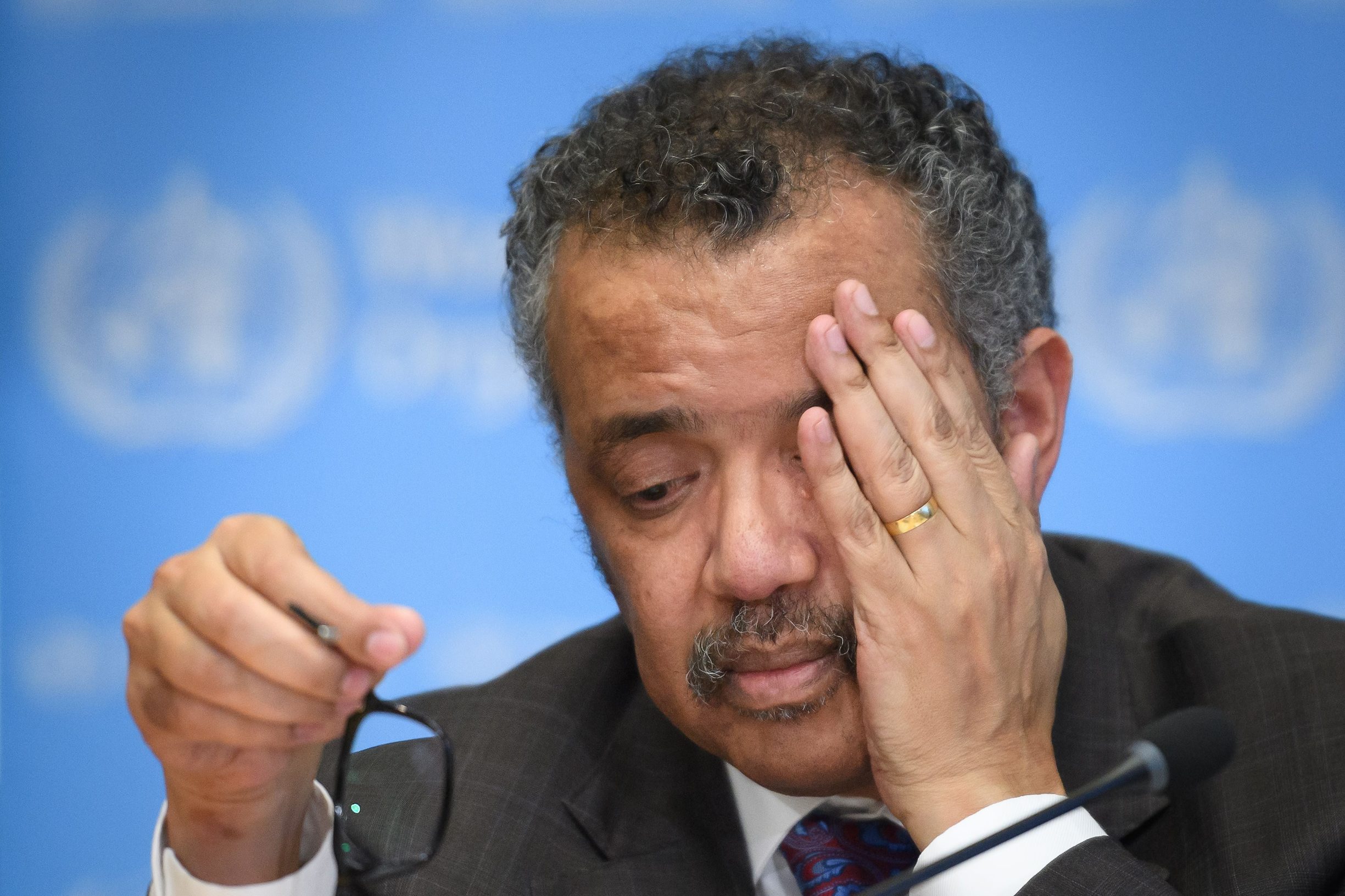 (FILES) In this file photo taken on February 28, 2020, World Health Organization (WHO) Director-General Tedros Adhanom Ghebreyesus attends a daily press briefing on COVID-19, the novel coronavirus, at the WHO headquaters in Geneva. - US President Donald Trump announced on April 14, 2020, a suspension of US funding to the World Health Organization because he said it had covered up the seriousness of the COVID-19 outbreak in China before it spread around the world. Trump told a press conference he was instructing his administration to halt funding while 