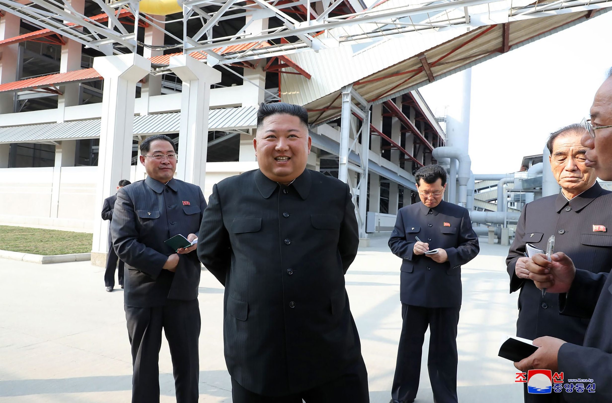 This picture taken on May 1, 2020 and released from North Korea's official Korean Central News Agency (KCNA) on May 2, 2020 shows North Korean leader Kim Jong Un (2nd L) visiting the completed Suchon phosphate fertilizer factory in South Pyongan Province, North Korea. (Photo by STR / KCNA VIA KNS / AFP) / - South Korea OUT / ---EDITORS NOTE--- RESTRICTED TO EDITORIAL USE - MANDATORY CREDIT 