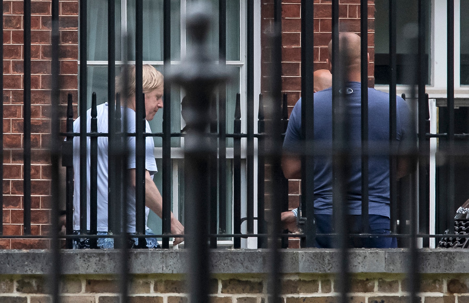 19/05/2020. London, UK. British Prime Minister BORIS JOHNSON is seen returning to Downing Street after a morning jog in a private gardens. The PM, who has pledged to tackle obesity in the UK, is recovering after being hospitalised with the COVID-19 strain of Coronavirus., Image: 520535593, License: Rights-managed, Restrictions: *** UK Out ***, Model Release: no, Credit line: Ben Cawthra / ddp USA / Profimedia