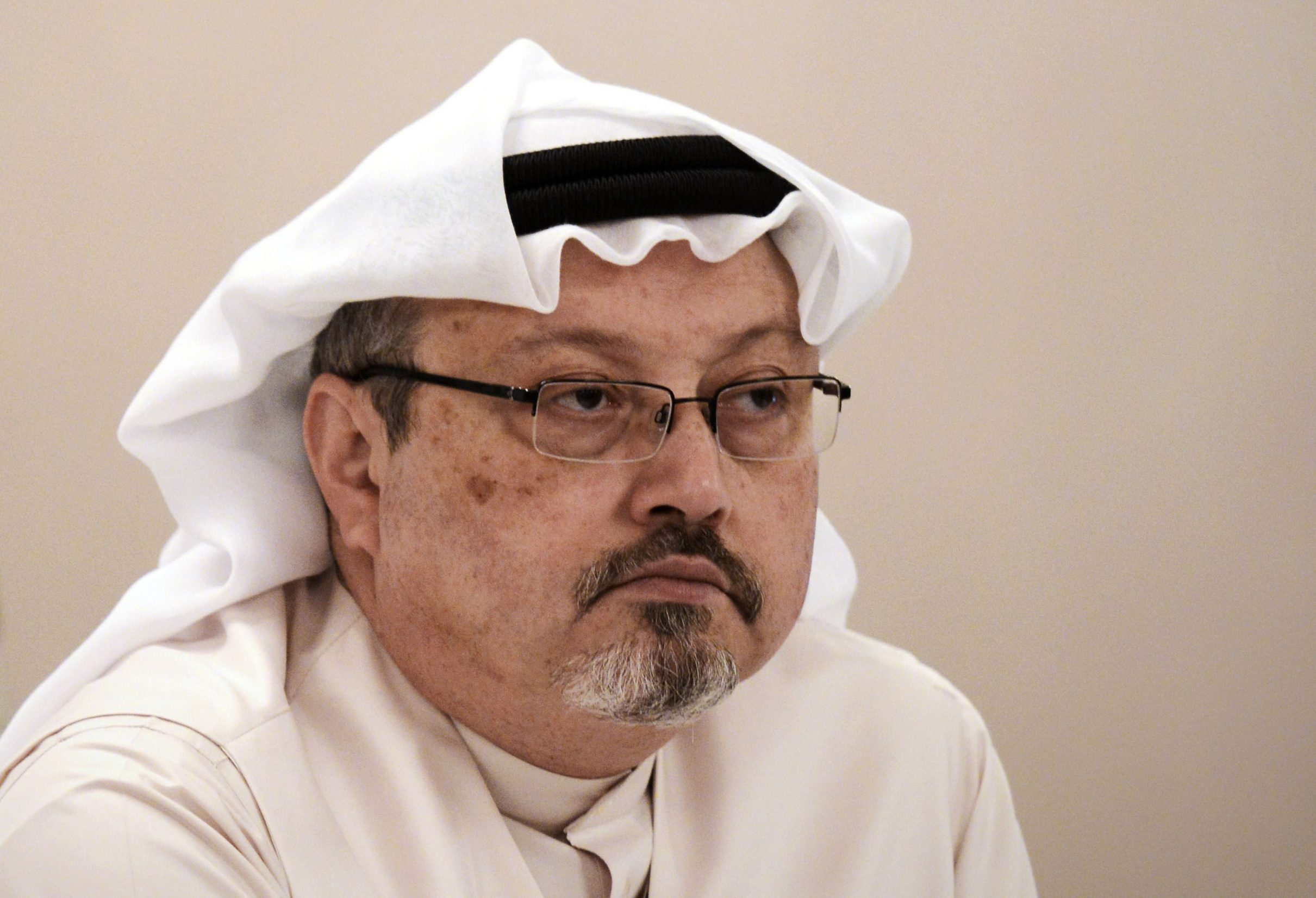 (FILES) In this file photo taken on December 15, 2014 Saudi journalist Jamal Khashoggi attends a press conference in the Bahraini capital Manama. - The sons of murdered Saudi journalist Jamal Khashoggi said Friday that they 