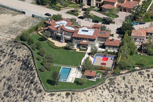 115970, Kourtney Kardashian's new .45 million Calabasas mansion is reportedly infested with dangerous mold. Kourtney, who is currently pregnant, purchased the home back in February. According to TMZ, a decorator found the mold covered by a coat of fresh paint, leading Kourtney, Scott Disick and their children to stay at a hotel for safety. ORIGINAL CAPTION: Kourtney Kardashian has purchased Keyshawn Johnson's mansion in The Oaks community in Calabasas for .45 million. The 6 bedroom, 9 bathroom 11,746 square foot house was built in 2011 sits on 1.86 acres on a cliff overlooking the Santa Monica Mountains. It is just down the street from Justin Bieber's former house which was recently snatched up by Kourtney's sister Khloe Kardashian. Kourtney and partner Scott Disick's children Mason and Penelope will have plenty of room to play on the property, which features a basketball court and a pool and jacuzzi. The basketball court at the house was lined with 14 toy cars. Calabasas, California - Thursday April 3, 2014., Image: 189362765, License: Rights-managed, Restrictions: , Model Release: no, Credit line: Calabrese, CelebrityHomePhotos / Pacific coast news / Profimedia