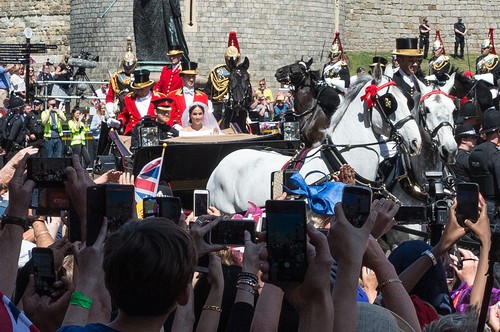 January 1, 2012 - London, London, United Kingdom - HRH Prince Harry and bride Meghan Markle ride in a state carriage through the streets of Windsor lined with well wishers. The couple were married at St. George's Chapel in Windsor, UK, Britain, on May 19, 2018, Image: 372278219, License: Rights-managed, Restrictions: * UK Rights OUT *, Model Release: no, Credit line: Ray Tang / Zuma Press / Profimedia