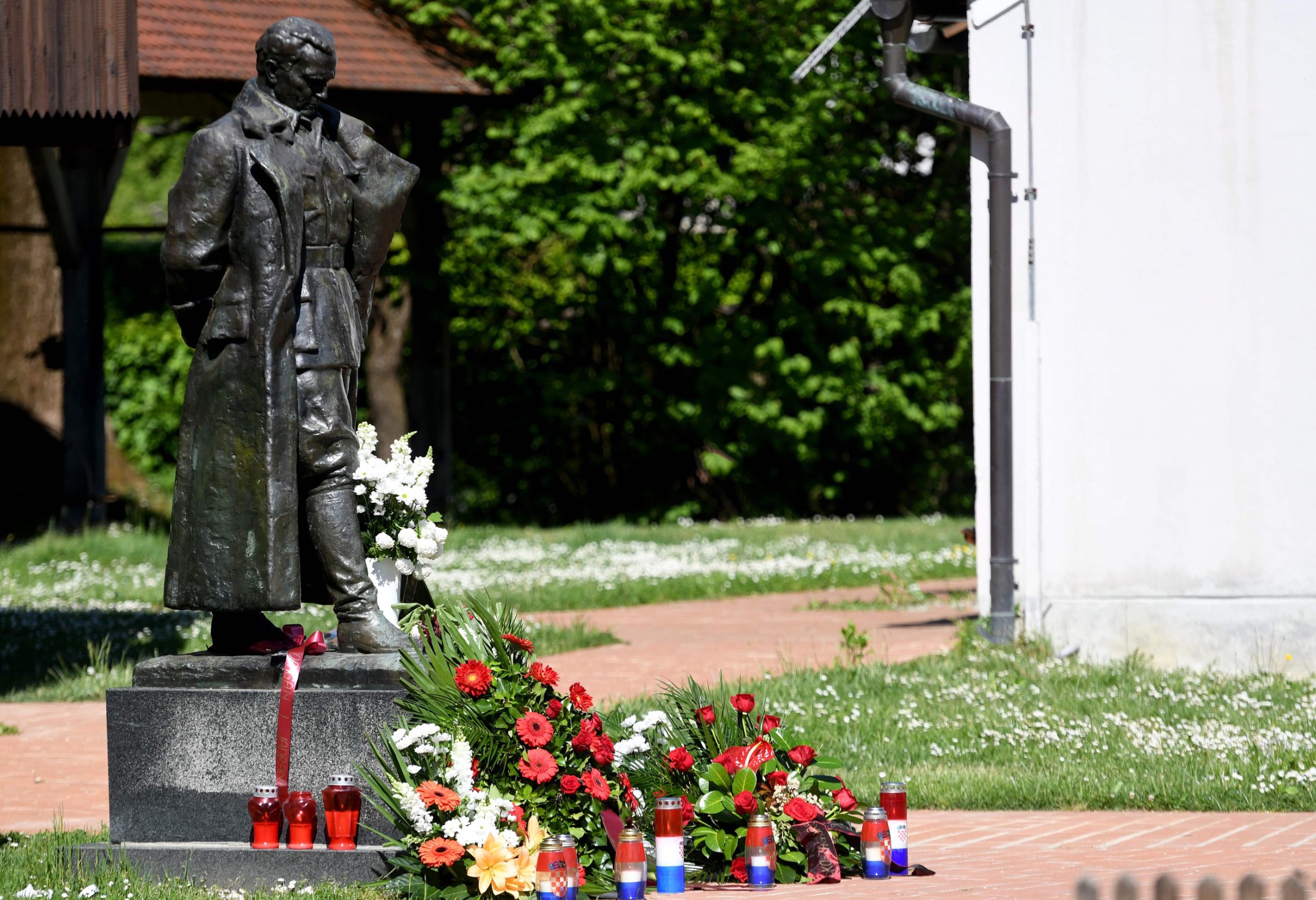 A picture taken on May 4, 2020 shows a monument dedicated to Tito, a statue by Croatian sculptor Antun Augustincic (19001979) of Josip Broz Tito (18921980), former President of communist Yugoslavia, next to the museum in Josip Broz Tito's birth house, in the village of Kumrovec, some 50 km from Zagreb. - Tito ruled the former Yugoslavia since World War II to his death at age 87 on May 4, 1980. A benevolent unifier or a power-hungry dictator? On the 40th anniversary of his death, the late Yugoslav leader Josip Broz Tito's legacy is still a topic of debate. (Photo by Denis LOVROVIC / AFP)