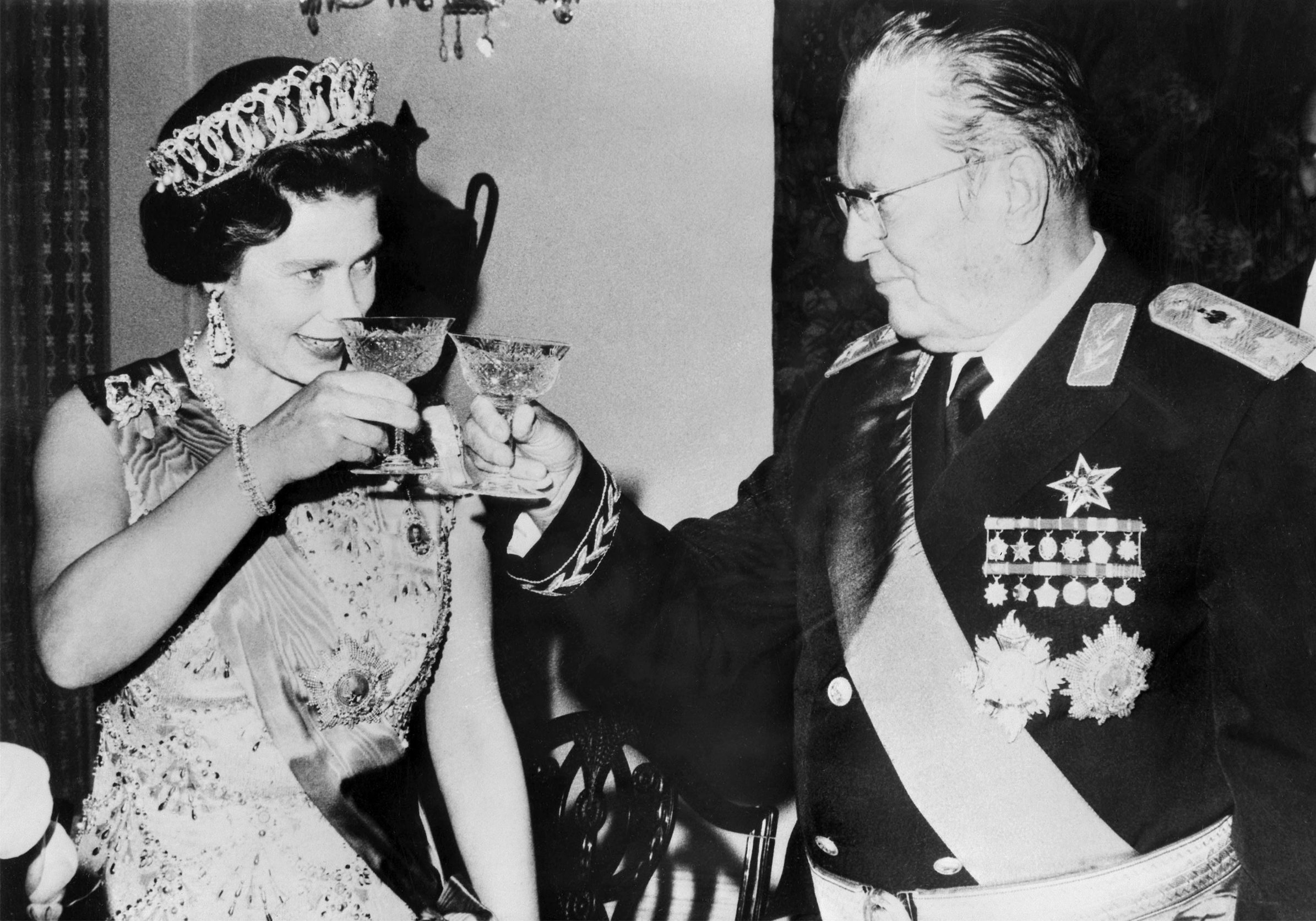 (FILES) In this file photo taken on October 21, 1972 The Queen Elizabeth II greets Marshall Josip Broz Tito during her official visit in Yougoslavia. - Josip Broz Tito, who died 40 years ago at the age of 88, was both revered and feared as the lifelong leader of former Yugoslavia, a country that later unravelled without his unifying presence. (Photo by - / AFP)