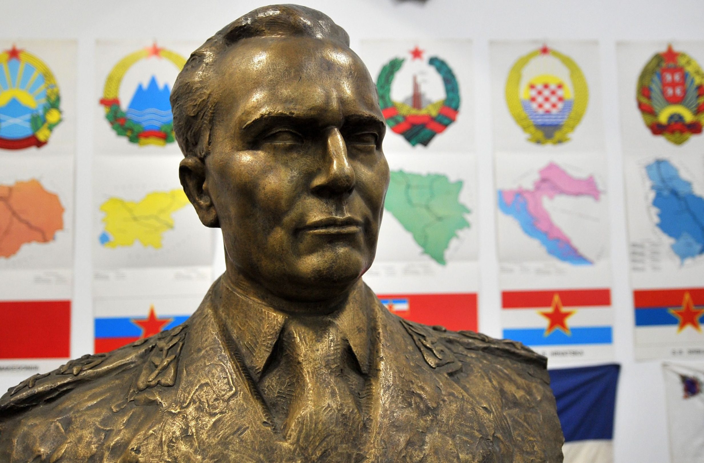 A picture taken on April 25, 2020 shows a bronze bust of ex-Yugoslav, socialist leader Josip Broz Tito at the entrance of 