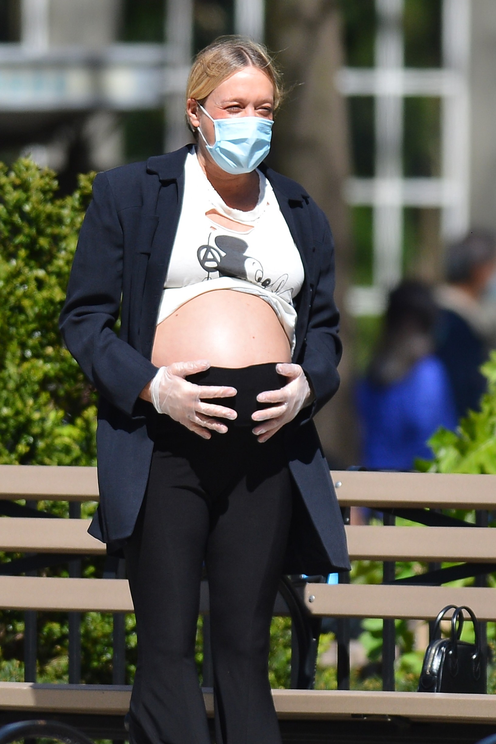 04/28/2020 EXCLUSIVE: Chloe Sevigny shows off her growing baby bump during an outing with boyfriend Sinisa Mackovic in New York City. The 45 year old actress wore a face mask, rubber gloves, black blazer, vintage t-shirt, bell bottoms, and black boots., Image: 515953594, License: Rights-managed, Restrictions: Exclusive NO usage without agreed price and terms. Please contact sales@theimagedirect.com, Model Release: no, Credit line: TheImageDirect.com / The Image Direct / Profimedia