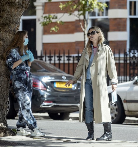 London, UNITED KINGDOM  - *EXCLUSIVE*  - English Supermodel Kate Moss and daughter Lila Grace pictured taking a break from Lockdown to grab a Joe and the Juice refreshment in Londons Westminster.

Model Kate is pictured wearing a protective mask whilst also making sure her daughter's face mask is secure, during the Covid-19 Pandemic, Kate along with her friends and family have been on Lockdown in The Cotswolds, Gloucestershire.

*UK Clients - Pictures Containing Children
Please Pixelate Face Prior To Publication*,Image: 522438780, License: Rights-managed, Restrictions: , Model Release: no, Credit line: BACKGRID / Backgrid UK / Profimedia