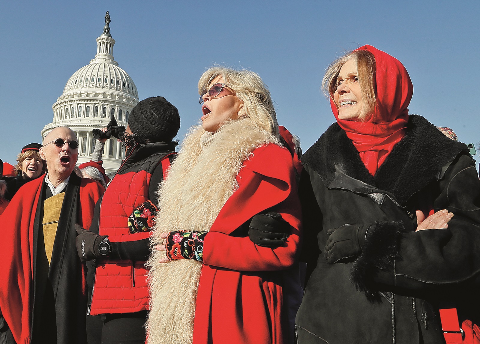 WASHINGTON, DC - DECEMBER 20: Actress and activist Jane Fonda (C) and Gloria Steinem (R) marches during the 