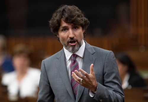 Canadian Prime Minister Justin Trudeau rises during a sitting of the Special Committee on the COVID-19 Pandemic in the House of Commons, in Ottawa, Wednesday, June 3, 2020.
Canadian Press, Ottawa, Canada - 03 Jun 2020,Image: 526430253, License: Rights-managed, Restrictions: , Model Release: no