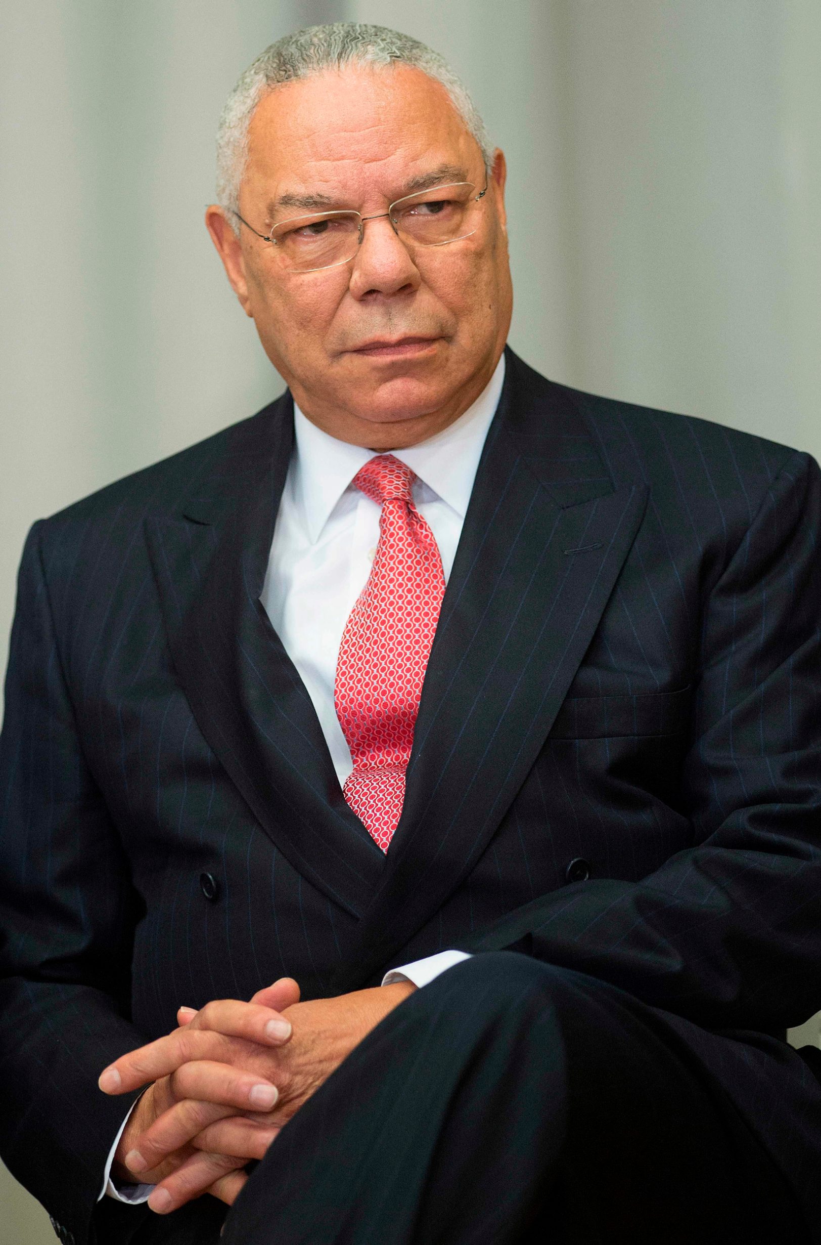 (FILES) In this file photo former US Secretary of State Colin Powell listens during a ceremony to break ground on the US Diplomacy Center at the US State Department in Washington, DC, September 3, 2014. - Colin Powell, who served as America's top military officer and top diplomat under Republican presidents, said June 7, 2020 he will vote for Democrat Joe Biden, accusing Donald Trump of drifting from the US constitution. In a scathing indictment of Trump on CNN, Powell denounced the US president as a danger to democracy whose lies and insults have diminished America in the eyes of the world. (Photo by Jim WATSON / AFP)