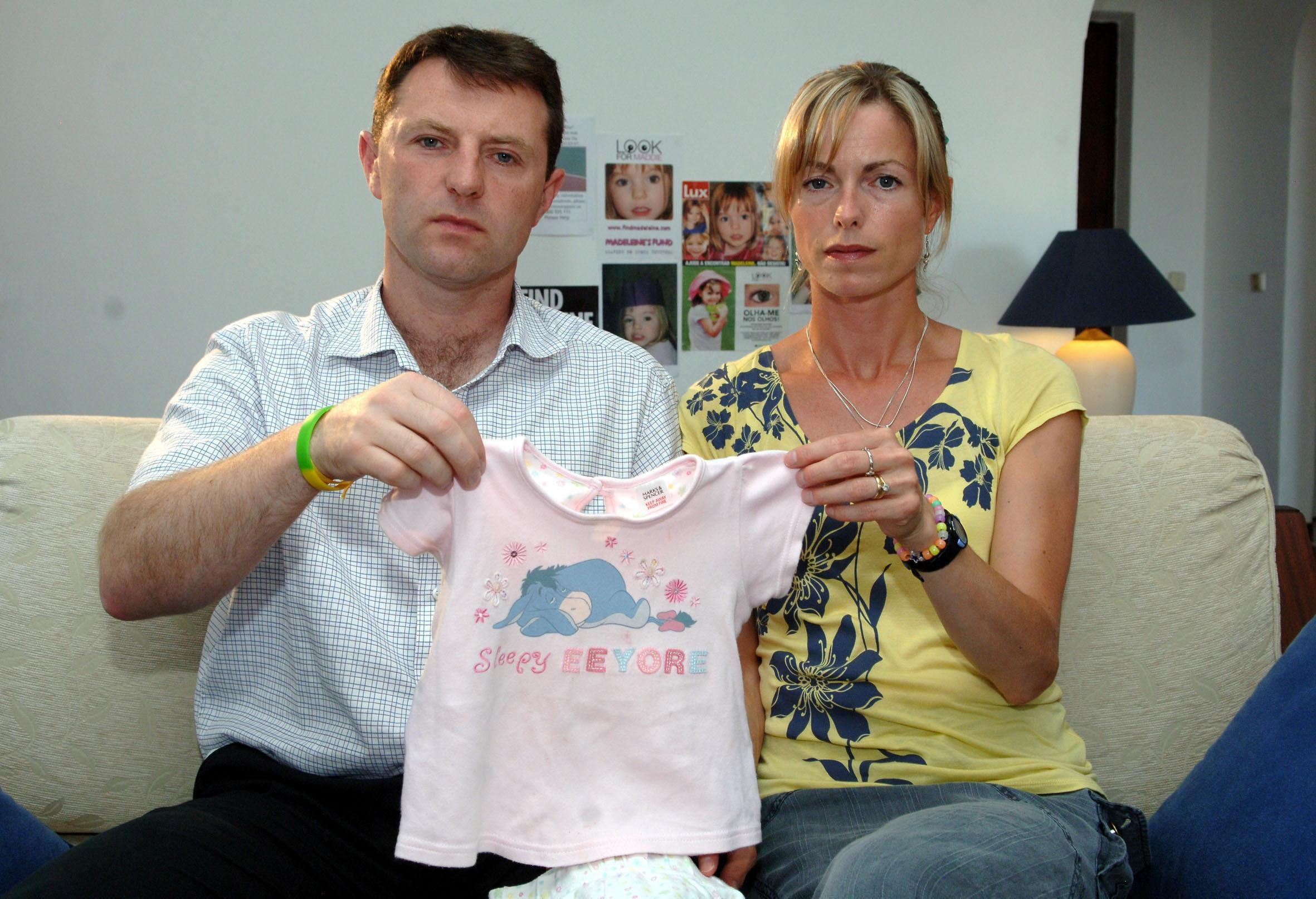 File photo dated 04/06/07 of Kate and Gerry McCann holding pyamas belonging to their daughter Amelie which are similar to the ones worn by daughter Madeleine on the night she went missing as they make an appeal for the BBC's Crimewatch programe, in Praia Da Luz, Portugal. A German prisoner has been identified as a suspect in the disappearance of Madeleine, detectives have revealed. The Metropolitan Police have not named the man, 43, who is described as white with short blond hair, possibly fair, and about 6ft tall with a slim build.,Image: 526691870, License: Rights-managed, Restrictions: FILE PHOTO, Model Release: no, Credit line: Steve Parsons / PA Images / Profimedia