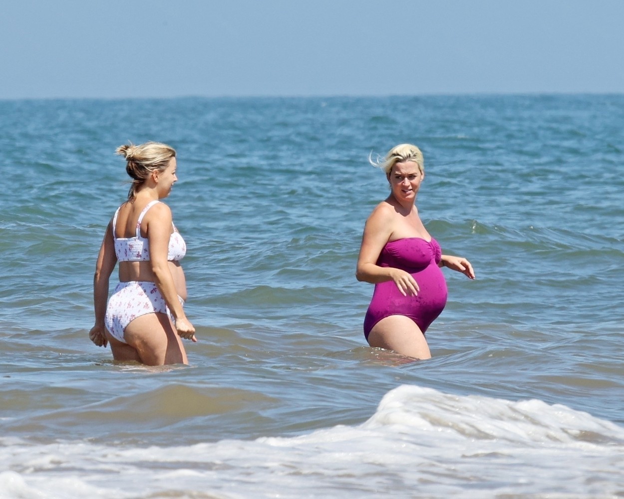 Malibu, CA  - *PREMIUM-EXCLUSIVE*  - *WEB EMBARGO UNTIL 9 AM PDT ON JULY 14, 2020* The Roar singer who’s expecting her first child in August, waded in to cool off in the ocean with her pregnant friend as temperatures soared in Southern California.

*UK Clients - Pictures Containing Children
Please Pixelate Face Prior To Publication*,Image: 542496434, License: Rights-managed, Restrictions: RIGHTS: WORLDWIDE EXCEPT IN UNITED KINGDOM, Model Release: no, Credit line: Clint Brewer Photography / BACKGRID / Backgrid USA / Profimedia
