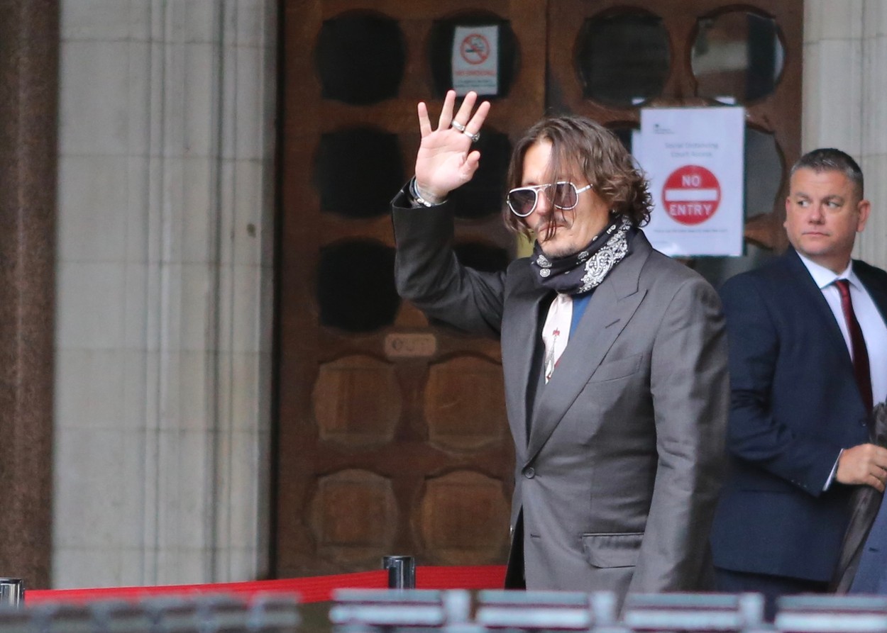 Johnny Depp seen arriving at the high court ahead of the second day of his court case against The Sun newspaper for libel. Depp is suing the newspaper for calling him a 