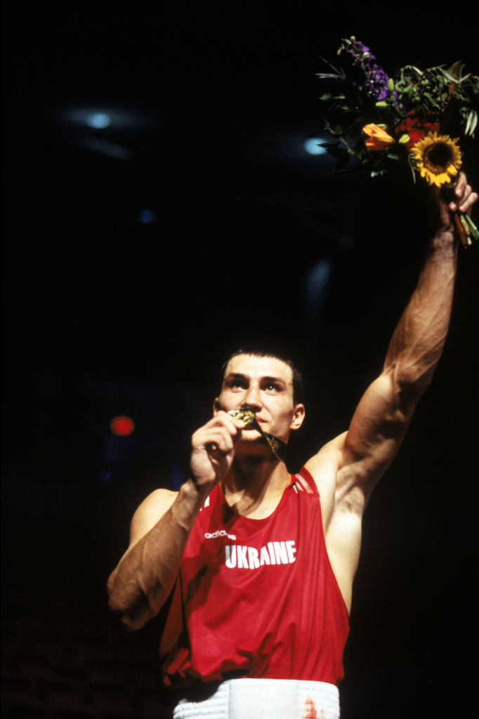 ATLANTA - AUGUST 4:  Vladimir Klitschko of the Ukraine celebrates his Gold Medal win against Paea Wolfgram of Tongo in the 91kg final during the XXVI Olympic Games at Alexander Memorial Coliseum on August 4, 1996 in Atlanta, Georgia.  (Photo by Al Bello/Getty Images)